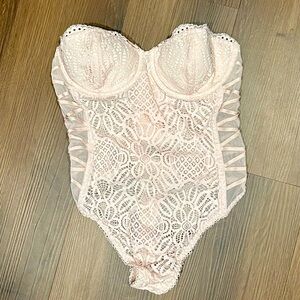 Light Pink Victoria’s Secret body suit size 34C